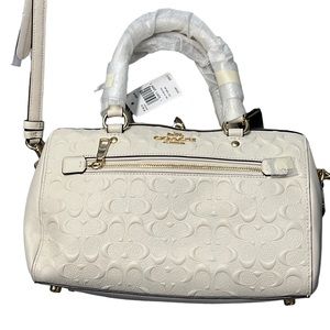 Nwt Rowan Coach purse with perforated logo can either be a satchel/crossbody